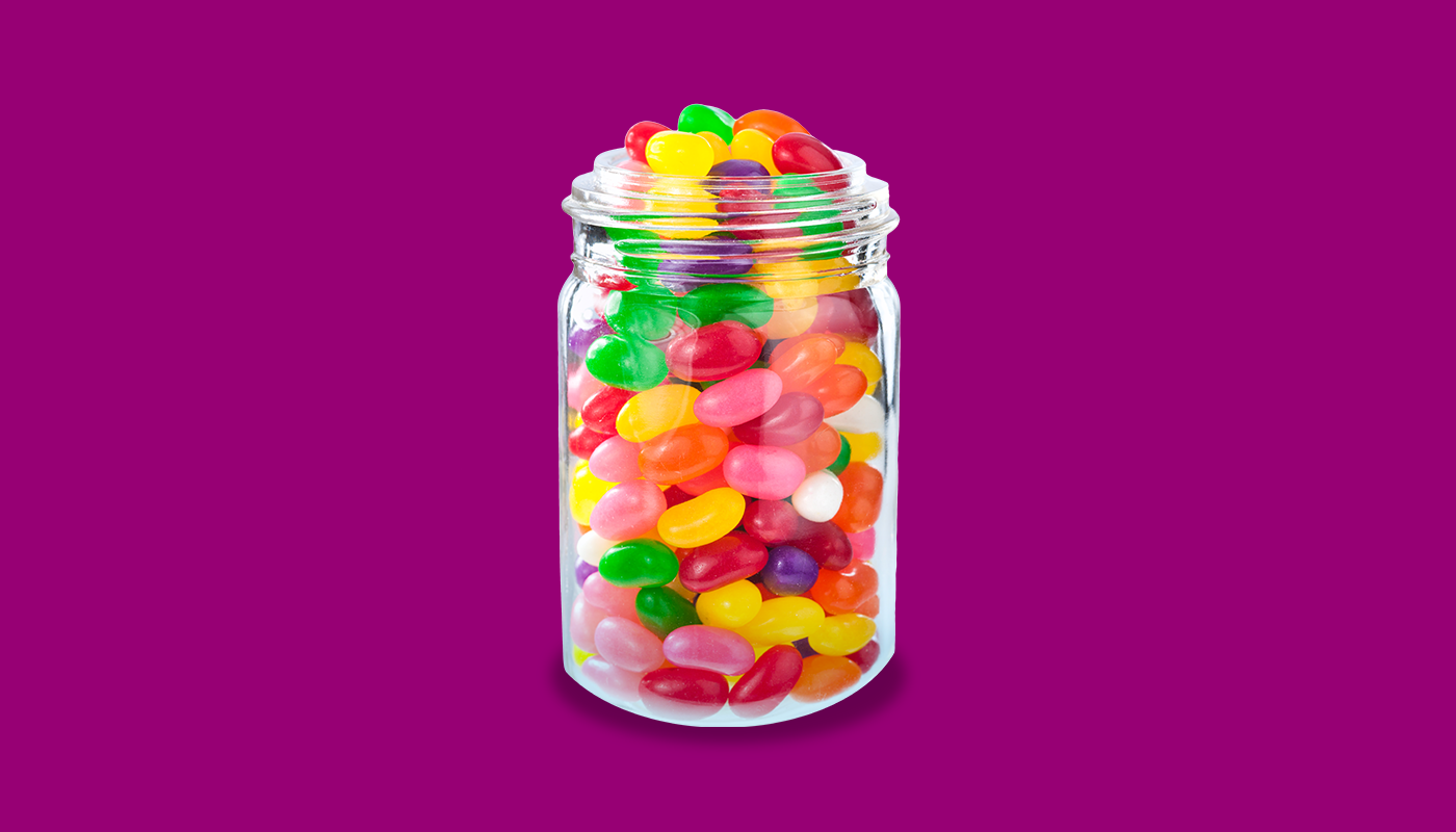 Jar full of different coloured jelly beans