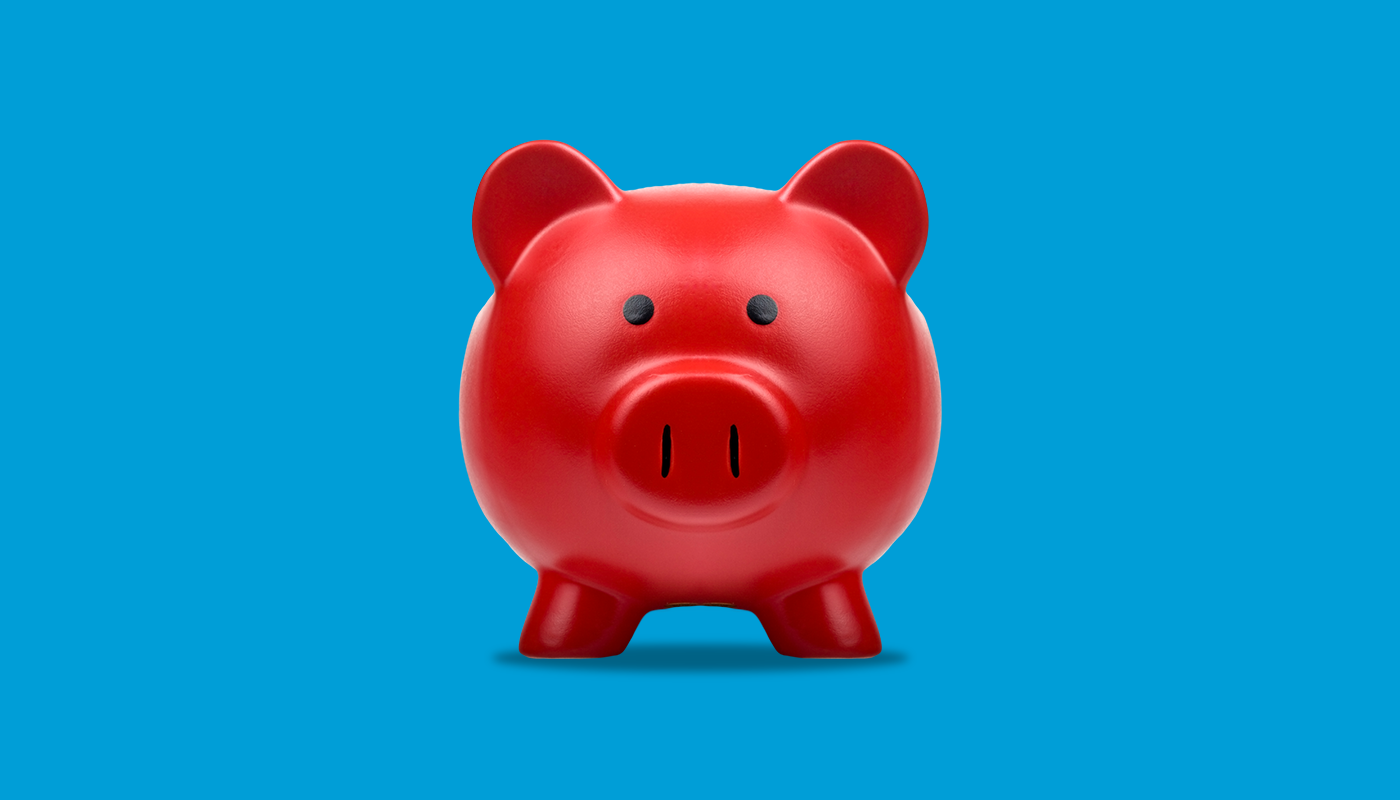Red piggybank for saving coins