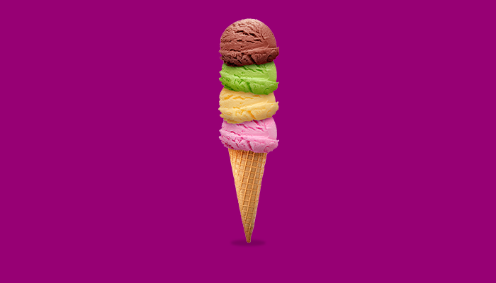 Ice cream cone with four different scoops